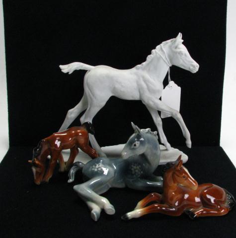 Appraisal: Four Porcelain Horse Figures including two Hummel colts with full