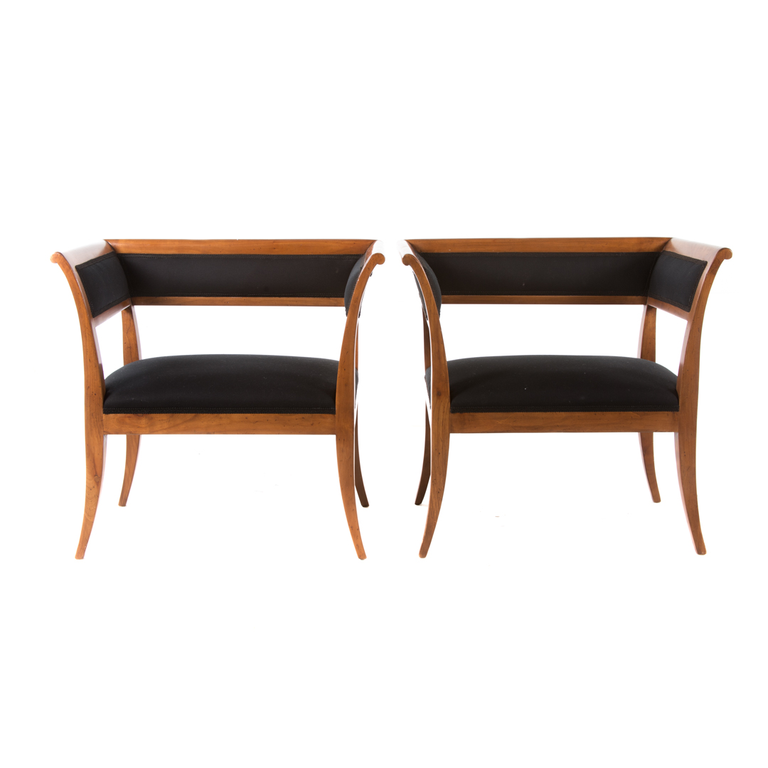 Appraisal: Pair of French Empire style cherrywood armchairs attributed to Guido