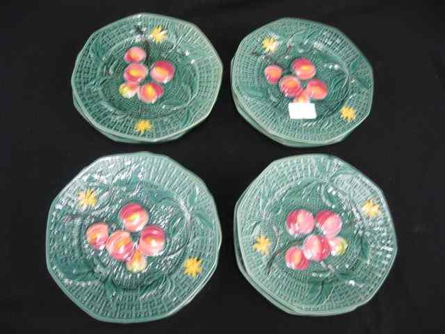 Appraisal: Majolica Pottery Plates fruit decor on green basketweave '' excellent