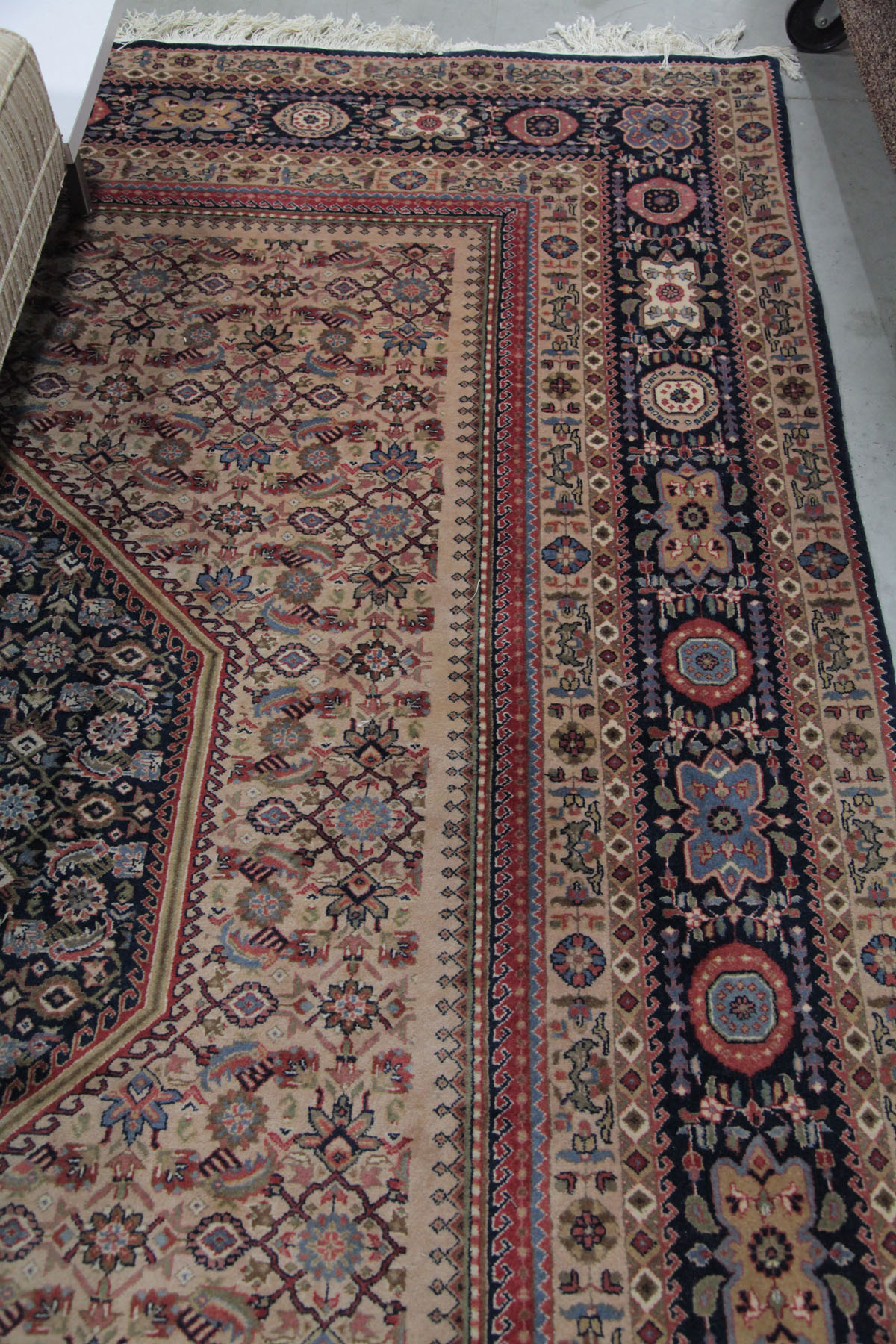 Appraisal: ROOMSIZE ORIENTAL STYLE RUG India mid th century Cream colored