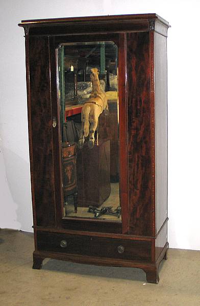 Appraisal: An Edwardian inlaid mahogany armoire first quarter th century height