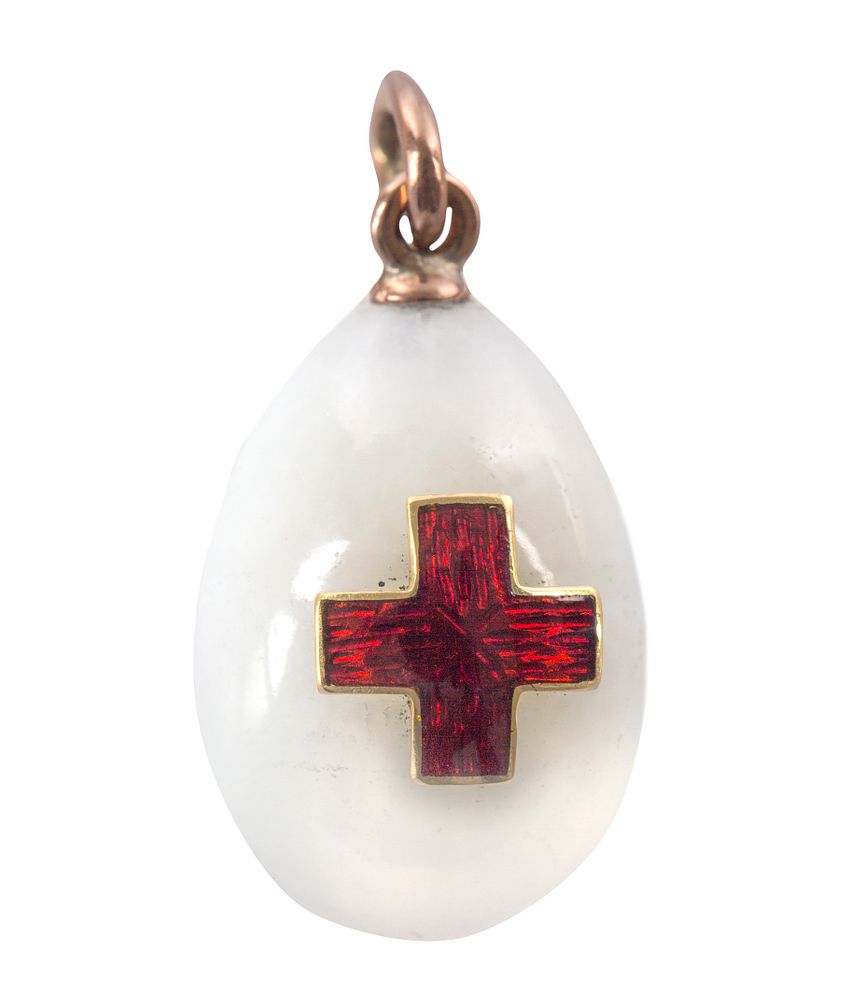 Appraisal: A FABERGE GOLD AND GUILLOCHE ENAMEL-MOUNTED HARDSTONE RED CROSS EGG