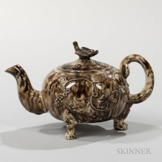 Appraisal: Staffordshire Brown Tortoiseshell-glazed Cream-colored Teapot and Cover England c squat