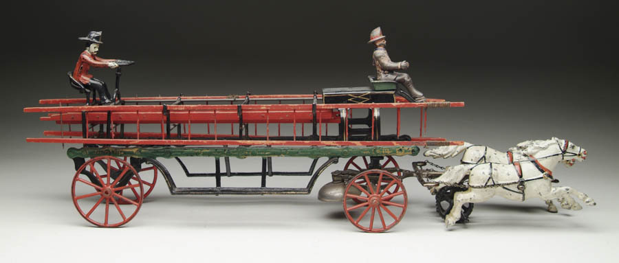 Appraisal: WILKINS HORSE DRAWN LADDER WAGON Delicately cast wagon black with