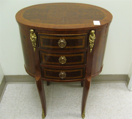 Appraisal: LOUIS XVI STYLE TABLE EN CHIFFONIERE the oval -drawer chest