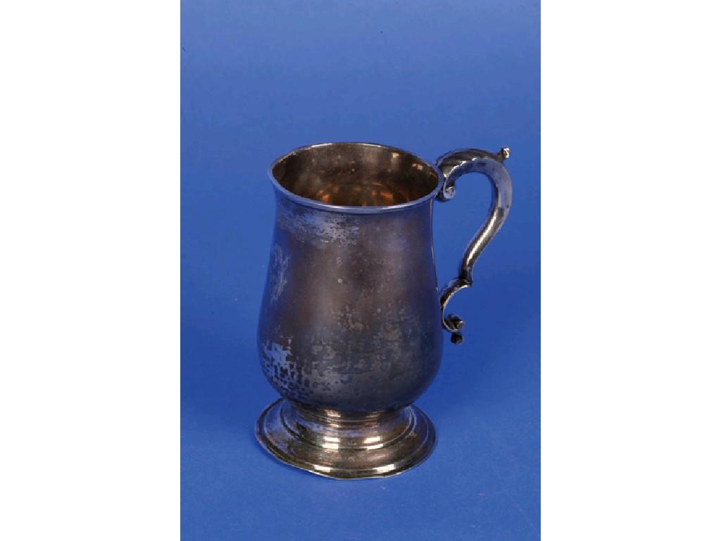 Appraisal: A GEORGE III MUG of baluster form with leaf capped