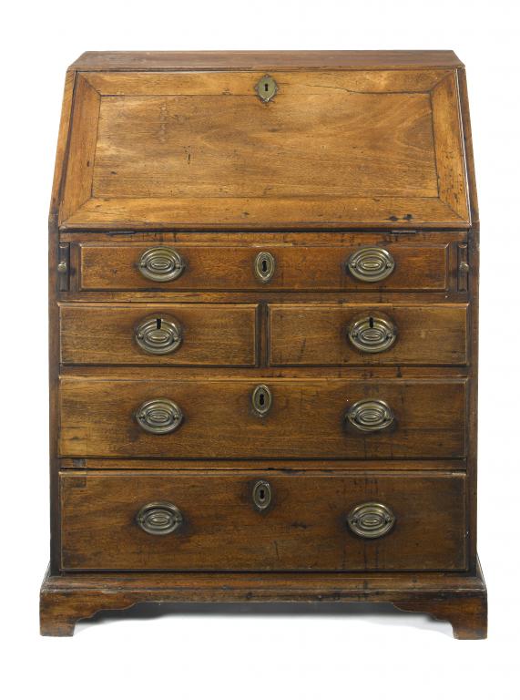 Appraisal: A GEORGE II MAHOGANY BUREAU with stepped and fitted interior