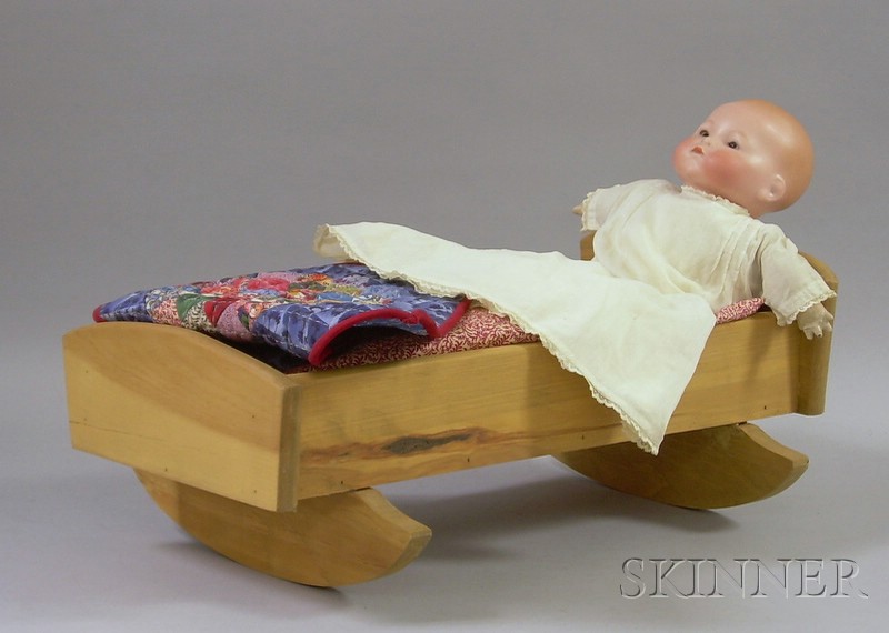 Appraisal: Armand Marseille Baby Doll with Later Cradle impressed AM with