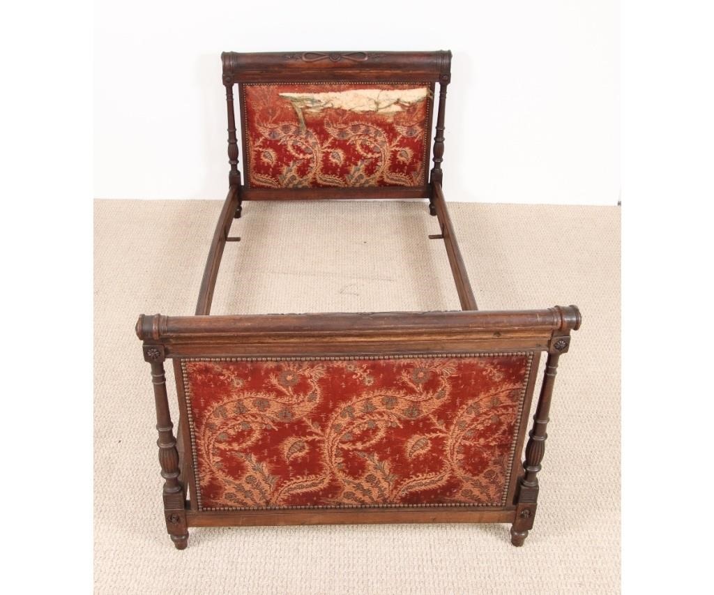 Appraisal: French walnut day bed circa with old fabric h x