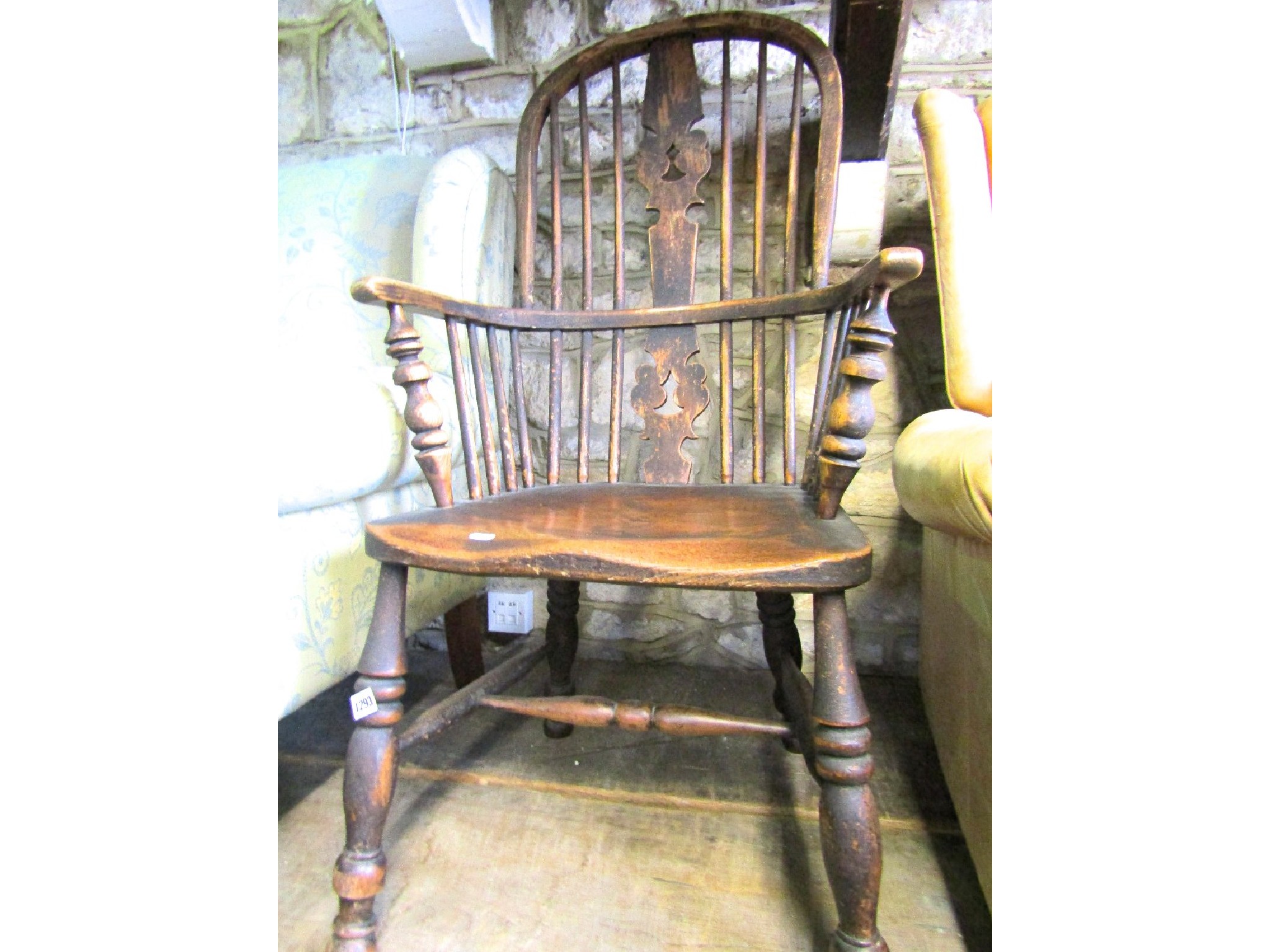 Appraisal: A th century Windsor hoop and stick back elbow chair