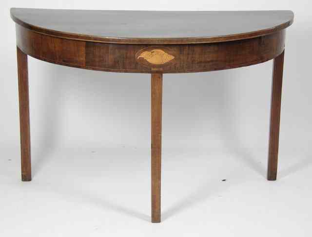 Appraisal: A George III mahogany demi-lune table the frieze inlaid with