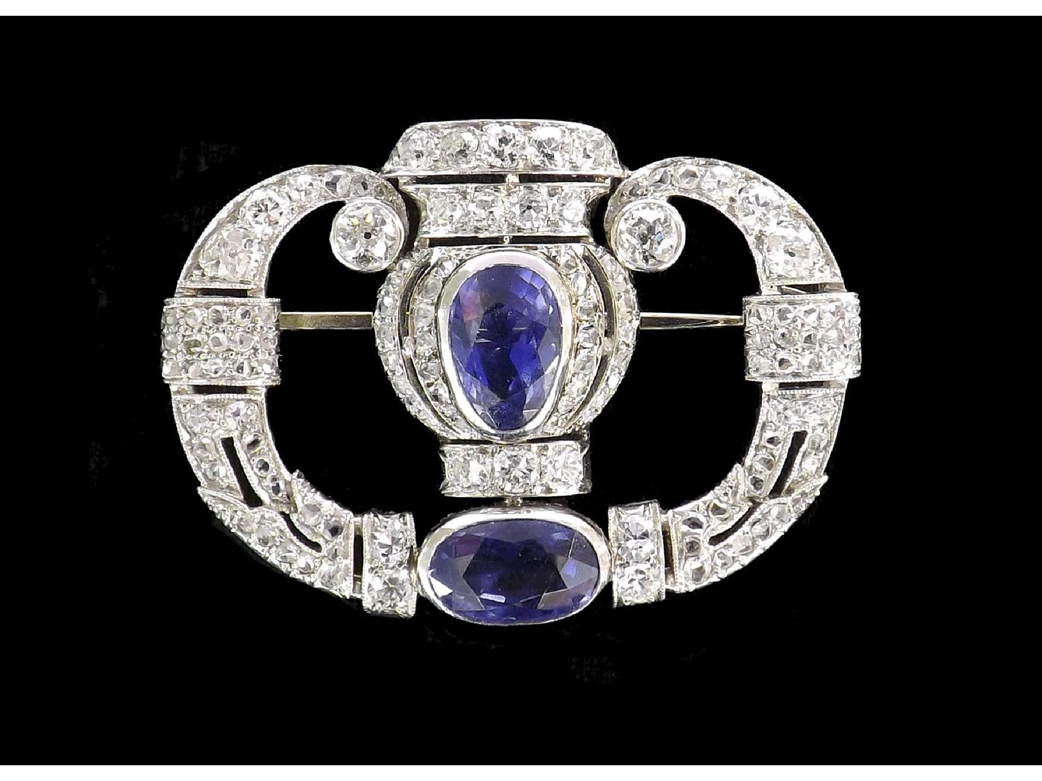 Appraisal: Pretty sapphire and diamond urn openwork brooch with two oval