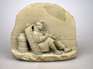 Appraisal: A th century Italian lava carving of a fisherman smoking