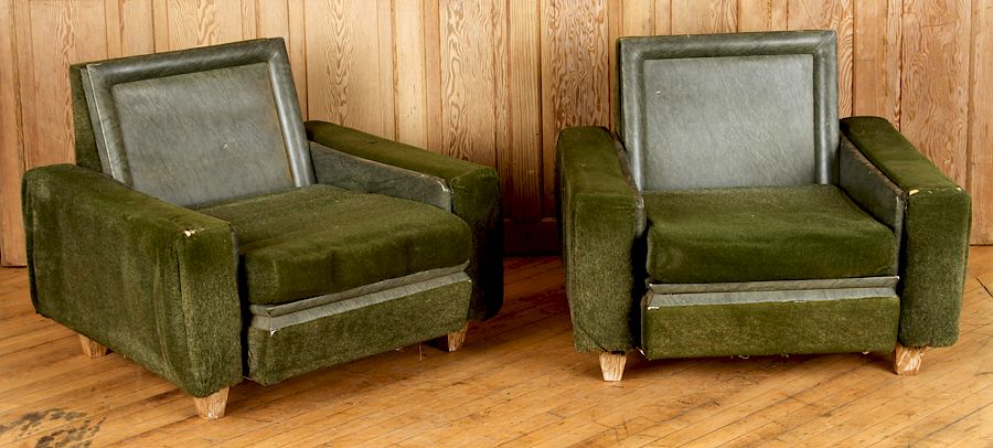 Appraisal: PAIR CLUB CHAIRS IN THE MANNER OF JACQUES ADNET A