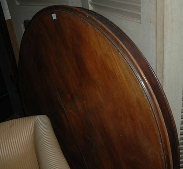 Appraisal: A CIRCULAR VICTORIAN MAHOGANY TABLE TOP Together with a rectangular