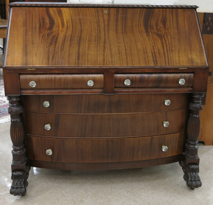 Appraisal: EMPIRE REVIVAL MAHOGANY SLANT-TOP SECRETARY American c featuring a slant