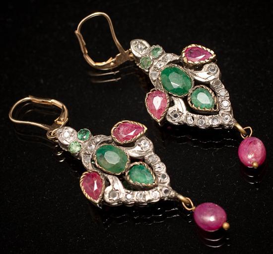 Appraisal: Pair of Victorian Arabesque style gilt metal emerald ruby and