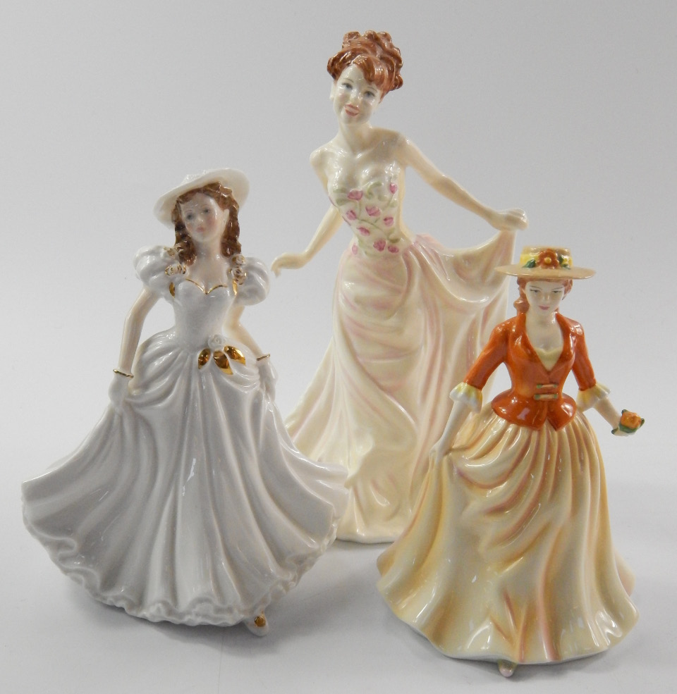 Appraisal: A Royal Worcester figure modelled as Congratulations together with a