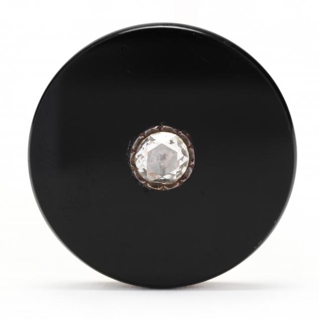 Appraisal: GOLD BLACK ONYX AND DIAMOND BROOCH The black onyx disc