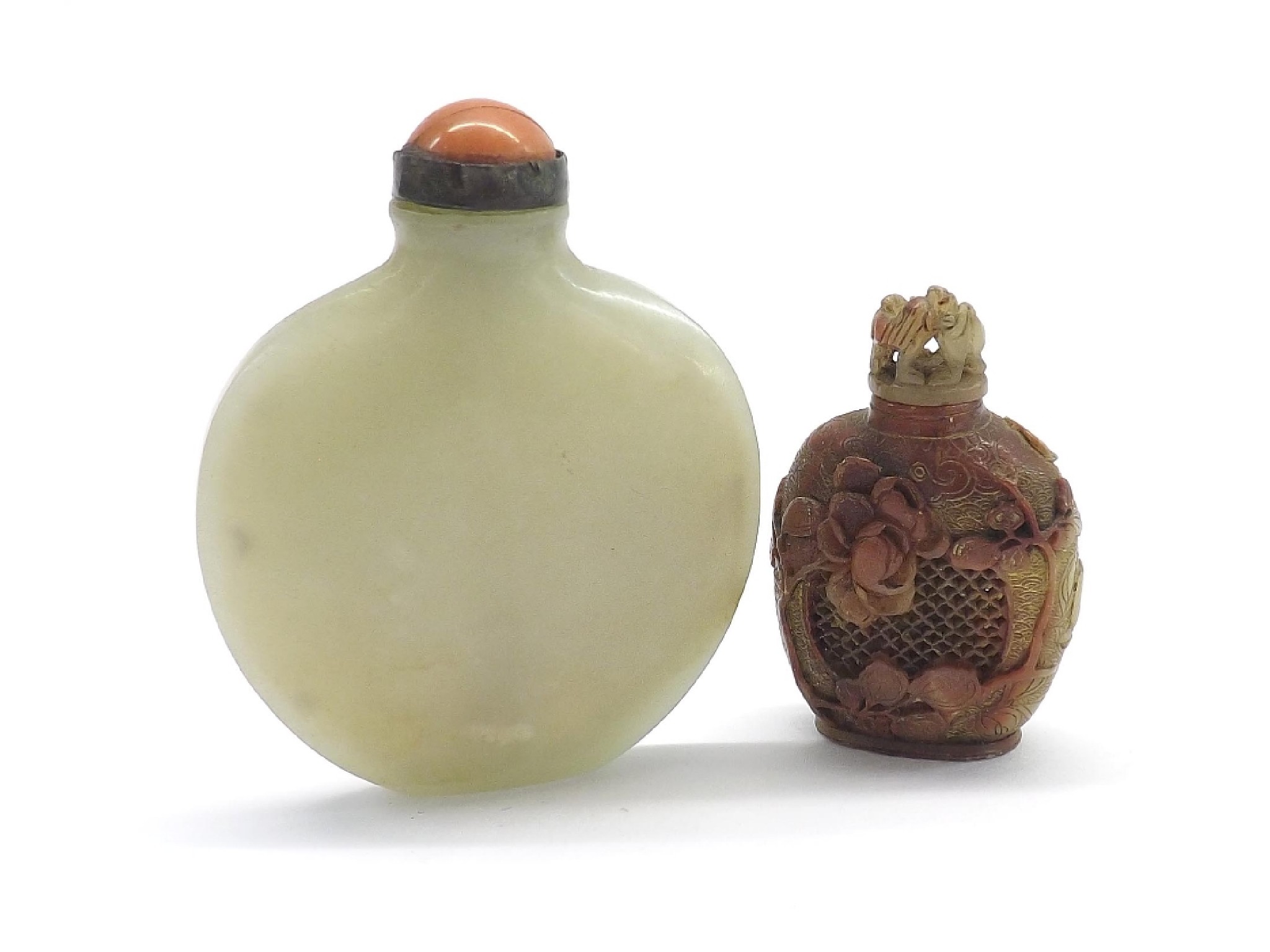 Appraisal: Pale celadon jade snuff bottle also another pierced and carved