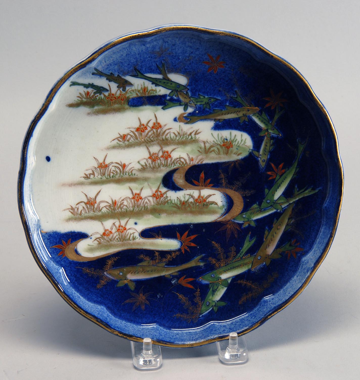 Appraisal: KORANSHA PORCELAIN SHALLOW BOWL Circa In flower form with fish