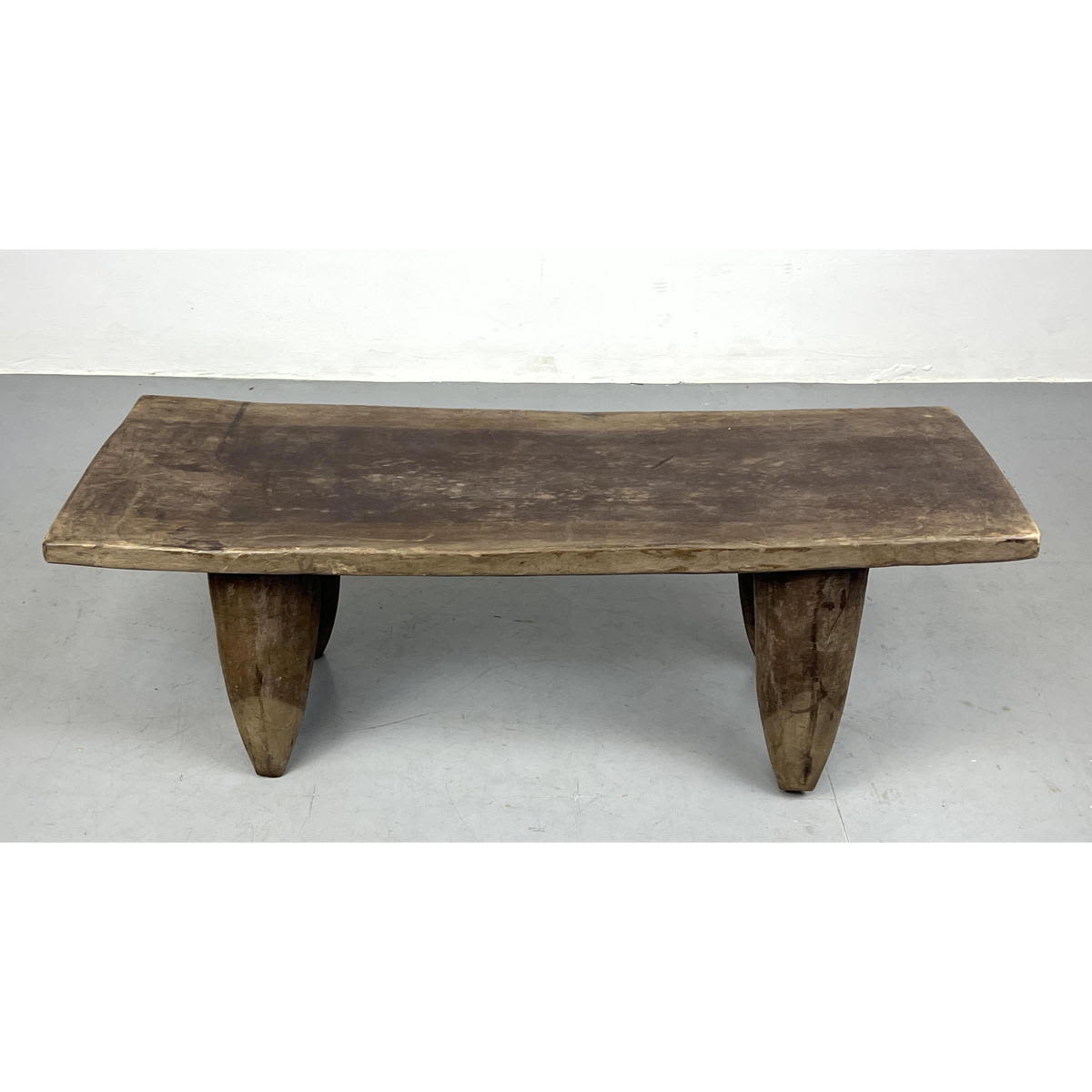 Appraisal: in Rustic Senufo style bench Solid wood In the style