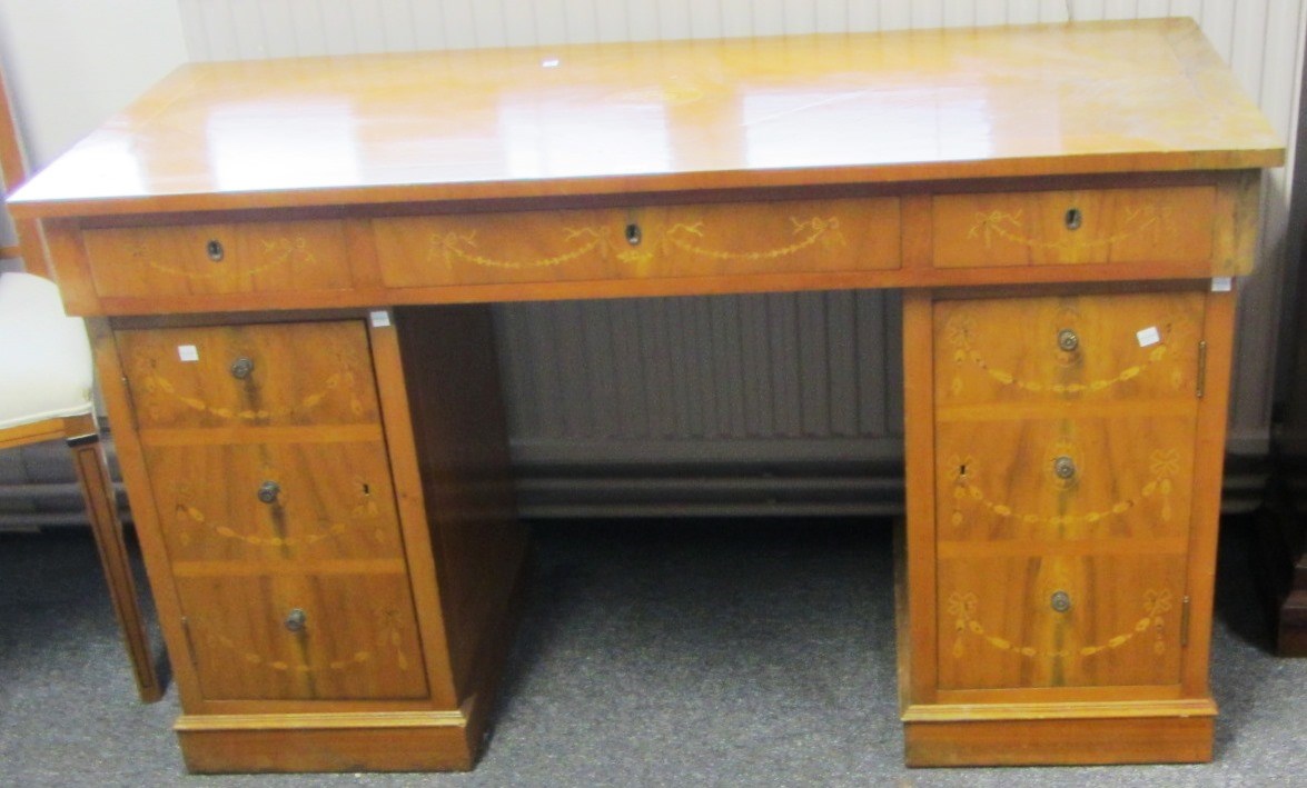 Appraisal: A th century European inlaid walnut pedestal desk on plinth