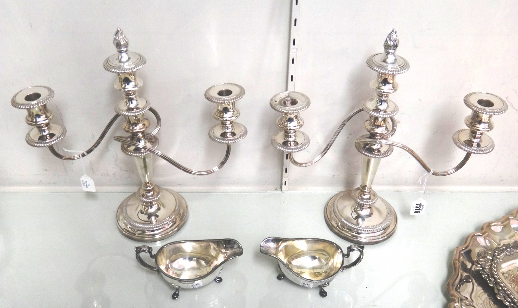 Appraisal: A pair of plated adjustable three light table candelabra each