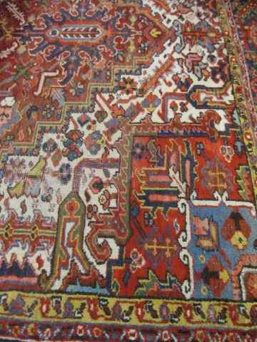 Appraisal: Heriz Persian Handmade Room Size Rug geometric and stylized florals