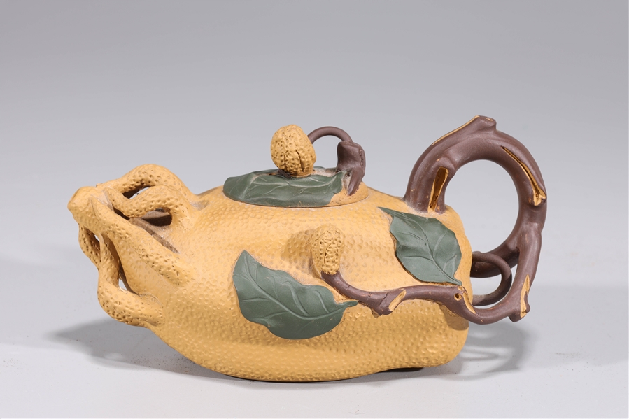 Appraisal: Elaborate Chinese Yixing teapot with seal mark to interior of