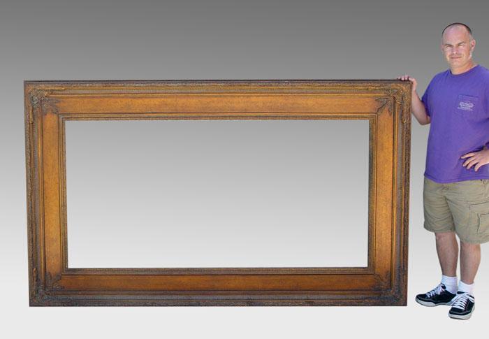 Appraisal: LARGE CARVED WOOD FRAME Bronze painted finish measures '' x