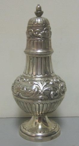 Appraisal: DUTCH SILVER PEPPER MILL CIRCA Relief scroll decoration and two