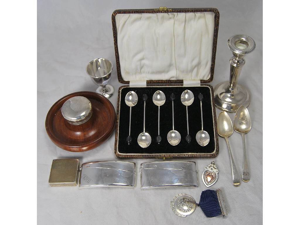 Appraisal: Small silver lot containing two curved card cases single candle