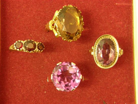 Appraisal: Four dress rings comprising an oval amethyst stamped a three