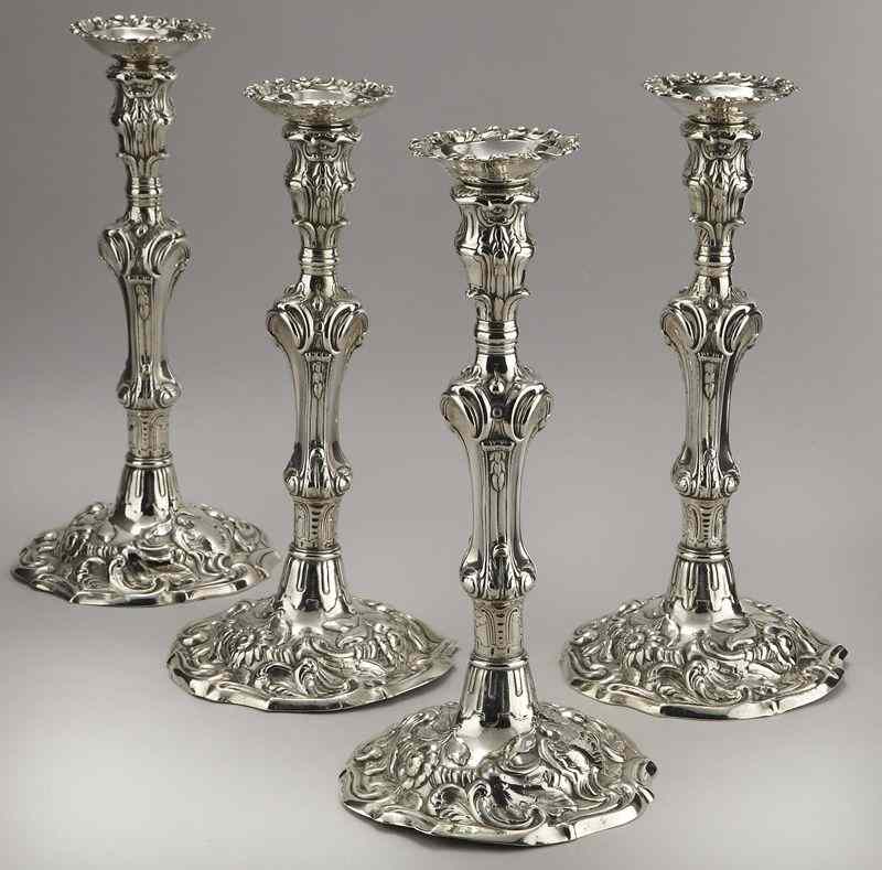 Appraisal: Set of George II silver candlestickswith removable bobeches the whole