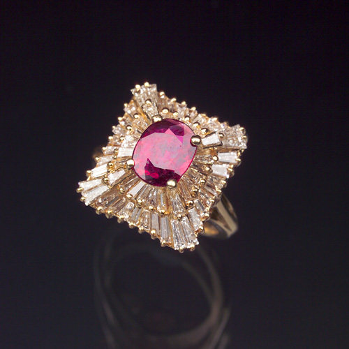 Appraisal: RUBY AND DIAMOND Ring in k yellow gold oval faceted