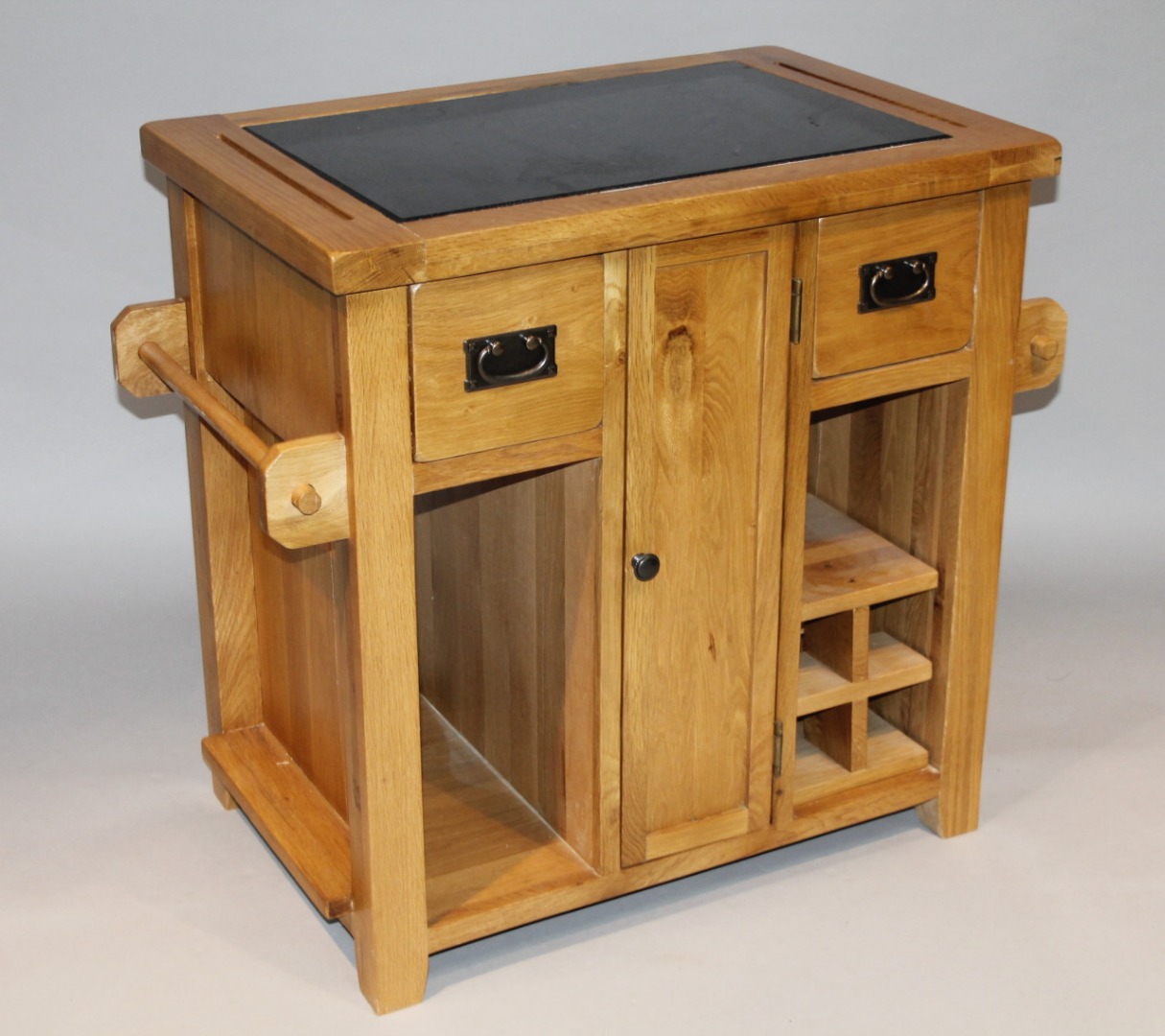 Appraisal: A modern oak finish kitchen side cabinet with a granite