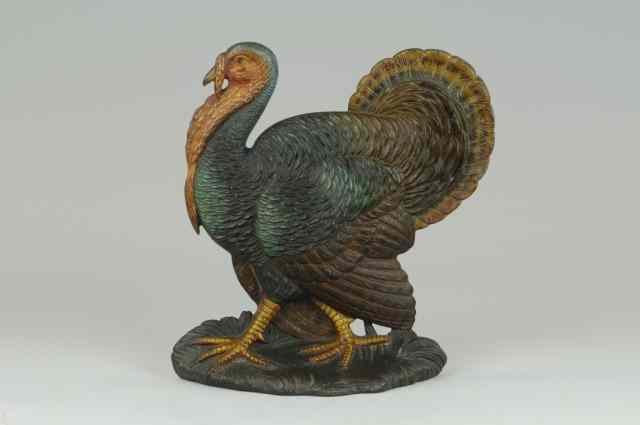 Appraisal: B H TURKEY DOORSTOP One of the larger Bradley Hubbard