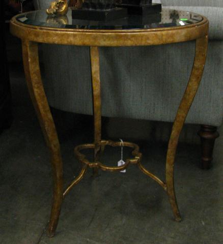 Appraisal: Cast metal glass top occasional table with bronzed base ''