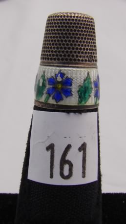 Appraisal: German enamel thimble with white floral band