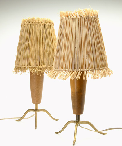 Appraisal: HAGENAUER Pair of table lamps with wooden shaft on three-legged