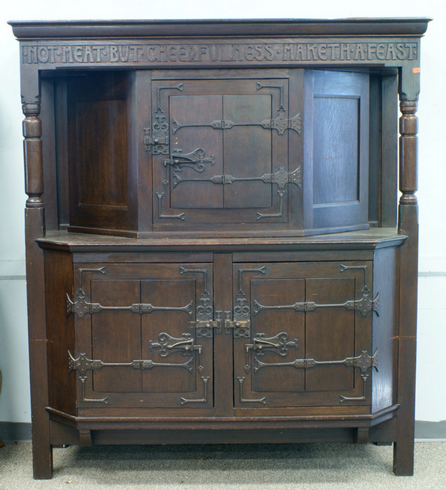 Appraisal: Carved oak Arts Crafts court cupboard all door with hinged