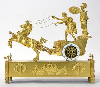 Appraisal: French Empire ormolu chariot mantel clock circa the chariot carrying