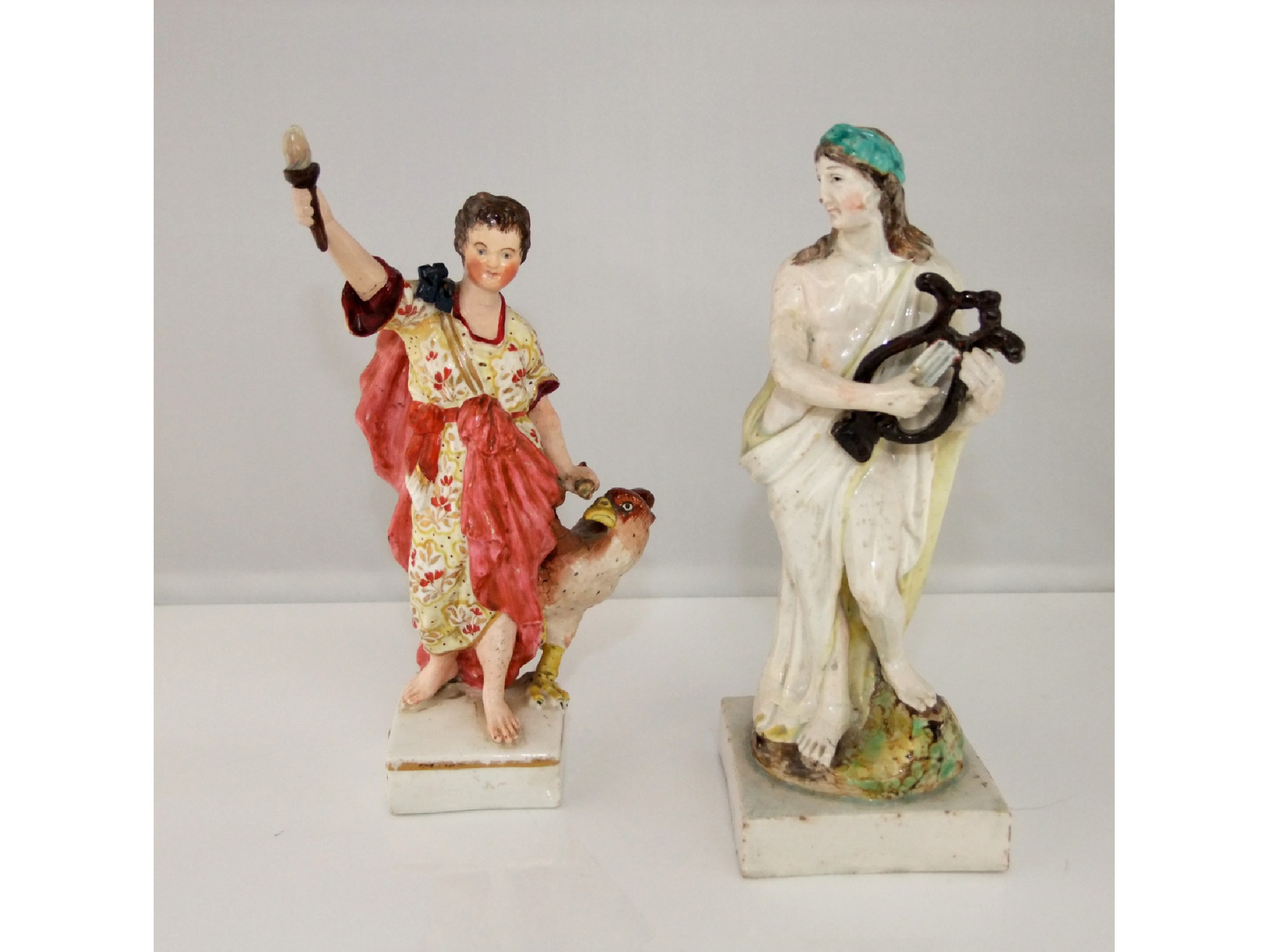 Appraisal: Two early th century Staffordshire figures of classical characters one