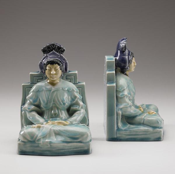 Appraisal: ROOKWOOD Pair of porcelain bookends designed by William P McDonald