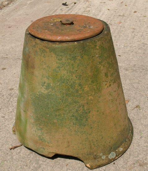 Appraisal: A terracotta rhubarb forcer conical with circular lid