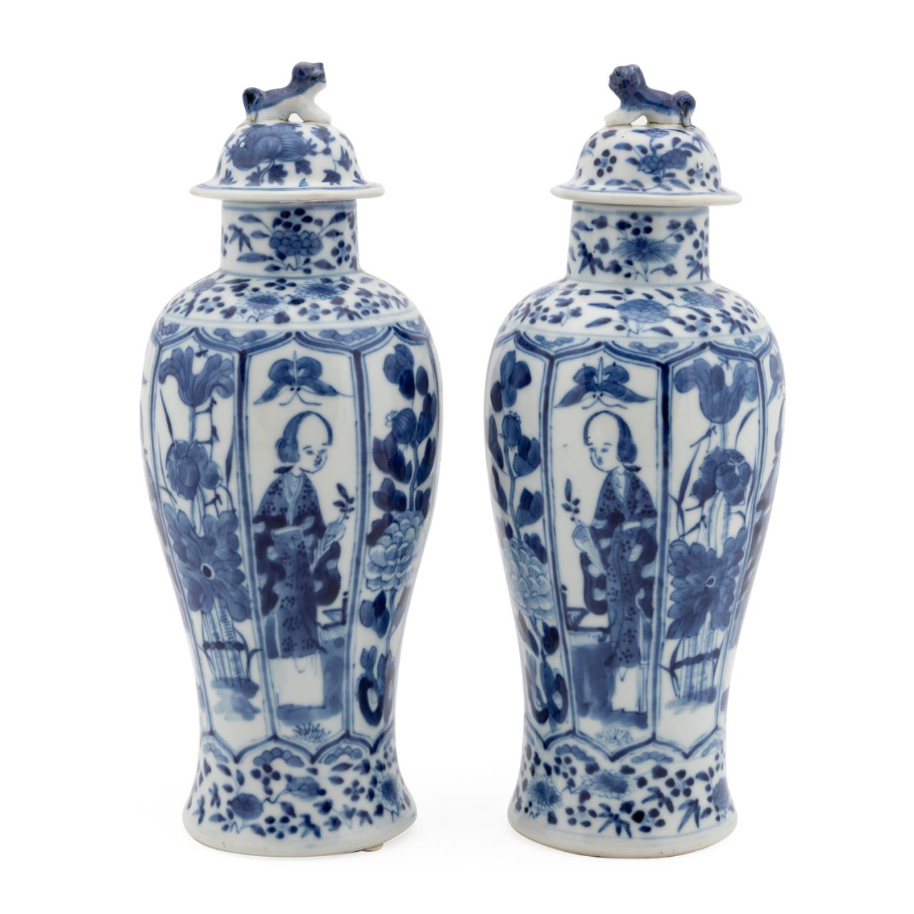 Appraisal: PAIR OF CHINESE BLUE AND WHITE LIDDED URNS Pair of