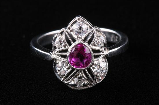 Appraisal: VINTAGE PLATINUM RUBY AND DIAMOND RING Pierced mounting centered with