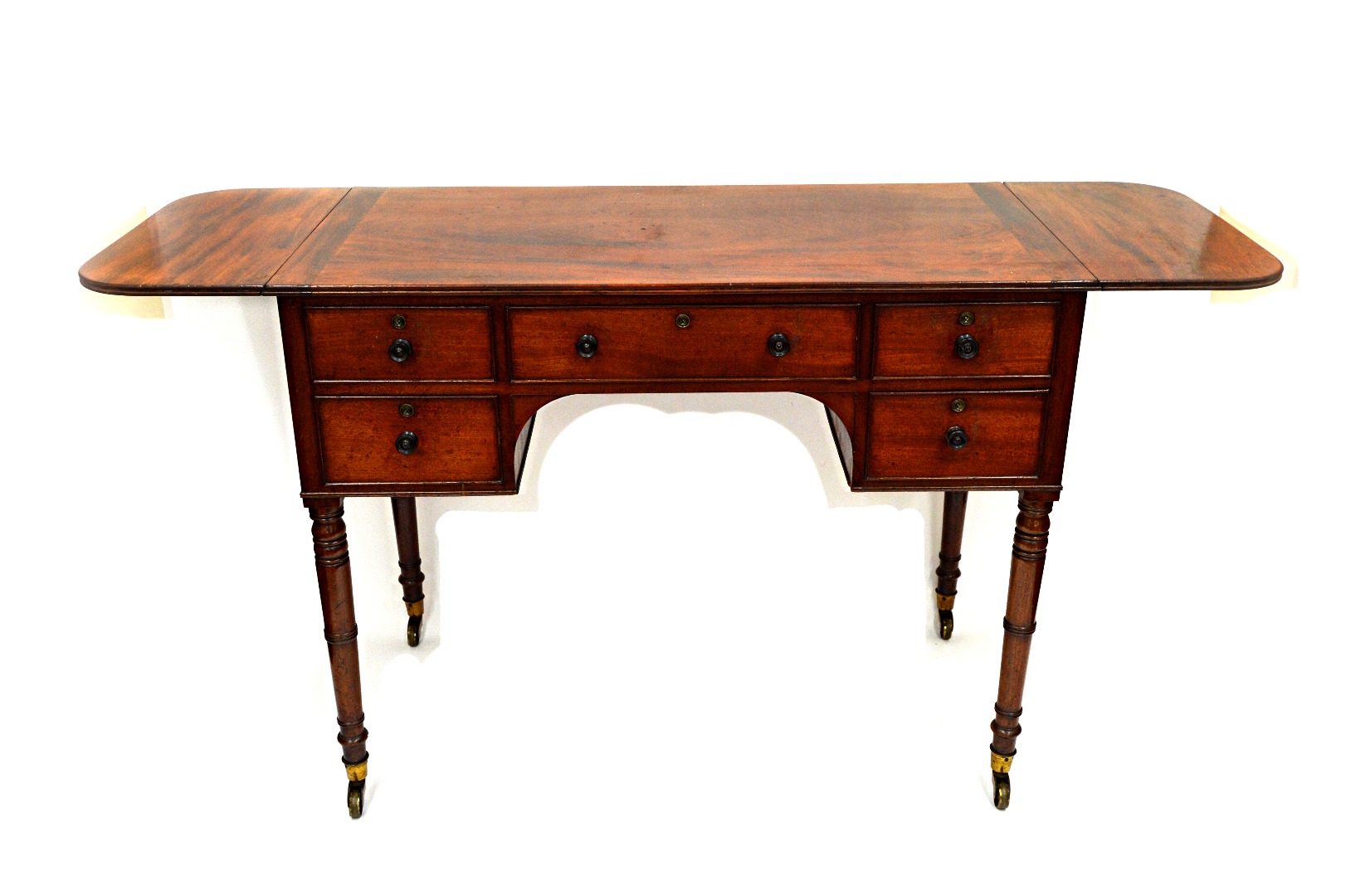 Appraisal: A Regency mahogany writing table the moulded edge top with