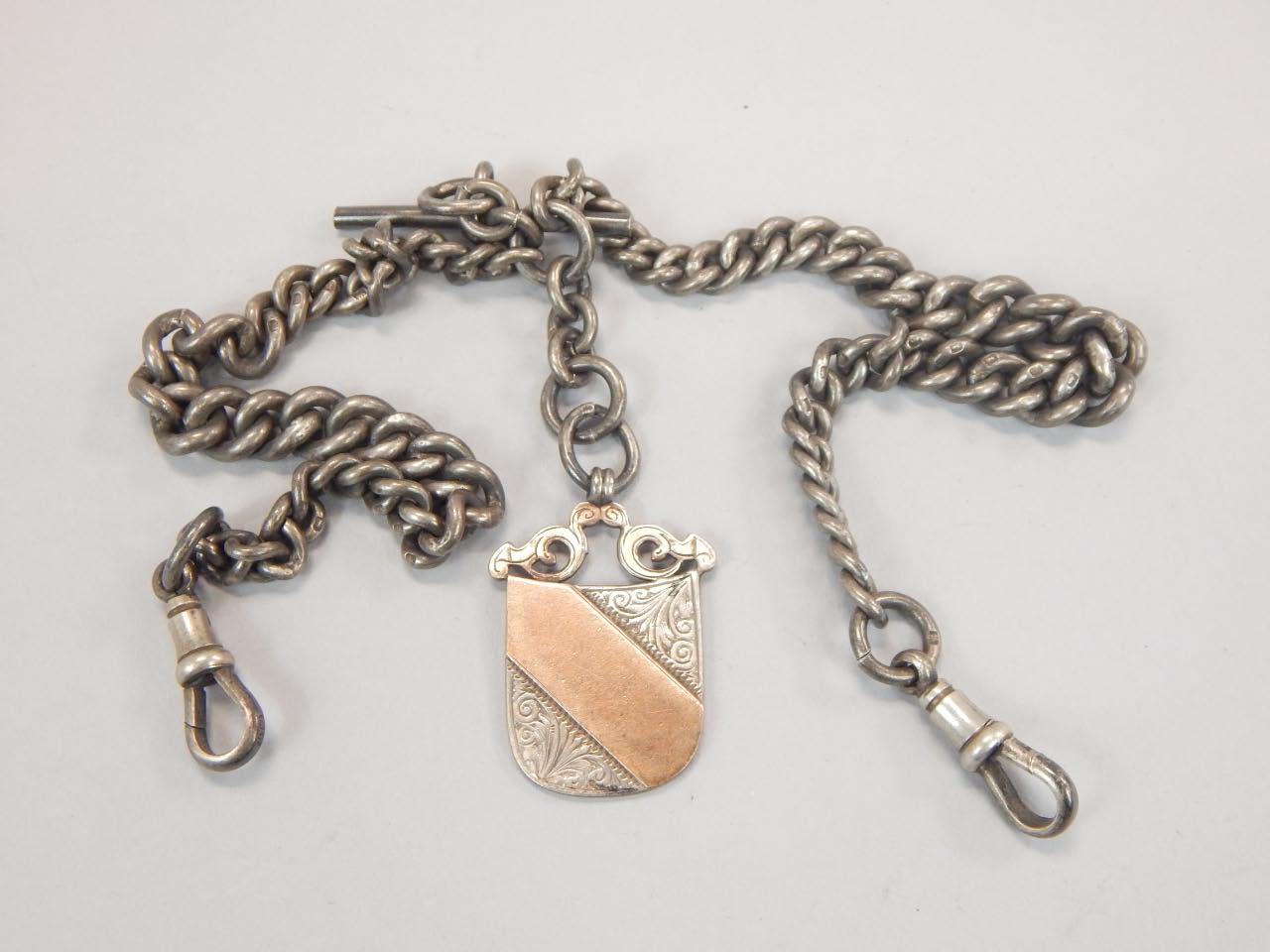 Appraisal: A silver watch chain and shield fob g all in